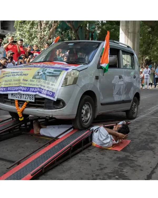This is a demonstration of extreme discipline and physical conditioning, a feat I perform to inspire my students and bring pride to our nation. It is a testament to the power of mind over body that I teach in every class.