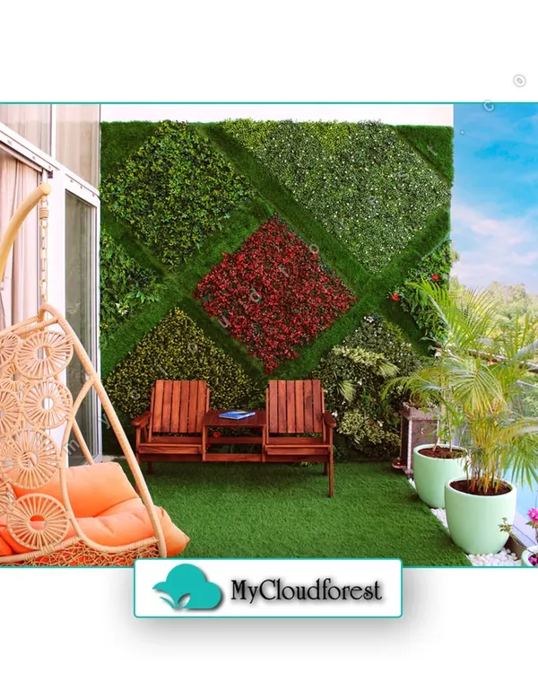 Your personal sky-high retreat awaits. This balcony design combines a comfortable rattan swing chair with a unique, patterned artificial vertical garden, creating a vibrant and playful corner. It proves that even compact spaces can become a lush paradise with a touch of creativity.