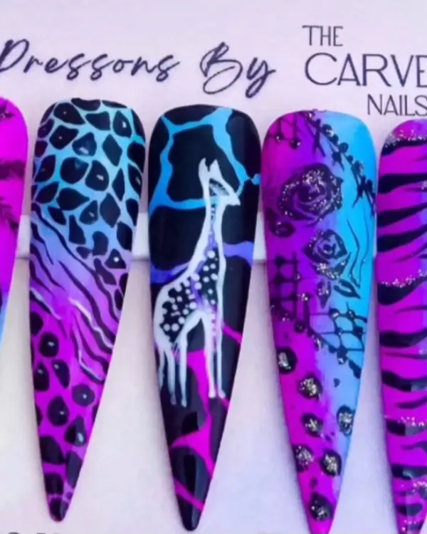 Entry number 7 from one of our nail art giveaways. The creativity in this animal print and floral combination is outstanding.