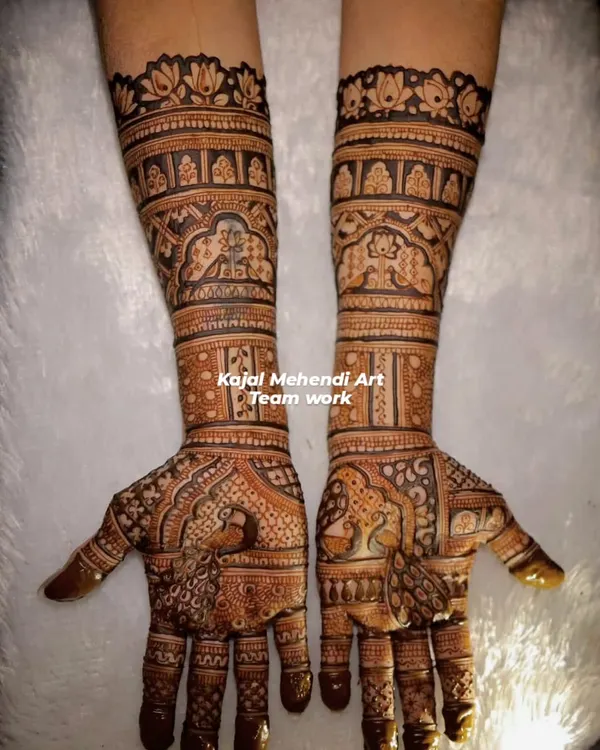 This full-arm bridal design, featuring traditional figures, was a proud moment for my team and me. The fine lines and flawless finishing show the dedication we bring to every large wedding order.