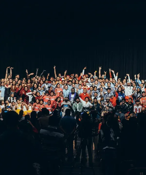 This is what it's all about. The energy, the lights, and our entire community on one stage. This is our 'Performance Night', the moment all our hard work, sweat, and laughter builds up to.