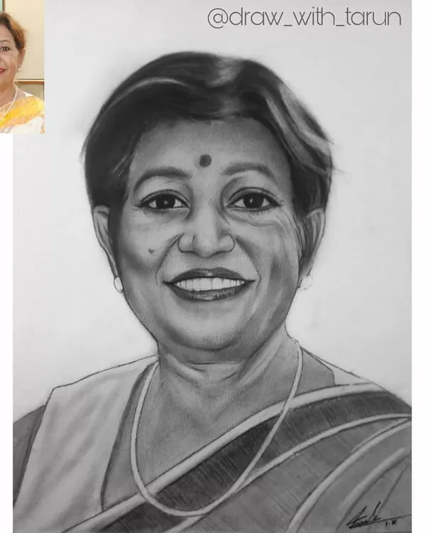 Here you can see the original photograph next to my finished 12x15 inch graphite portrait. My goal is always to accurately capture the likeness and spirit of the person.
