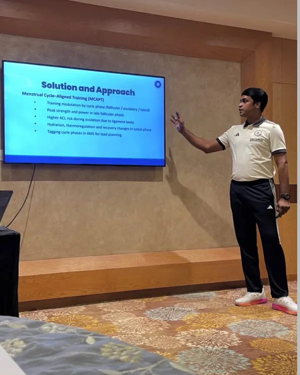 Presenting my data-driven approach to training. Here, I'm discussing Menstrual Cycle Aligned Training, a scientific method to optimize performance for female athletes.