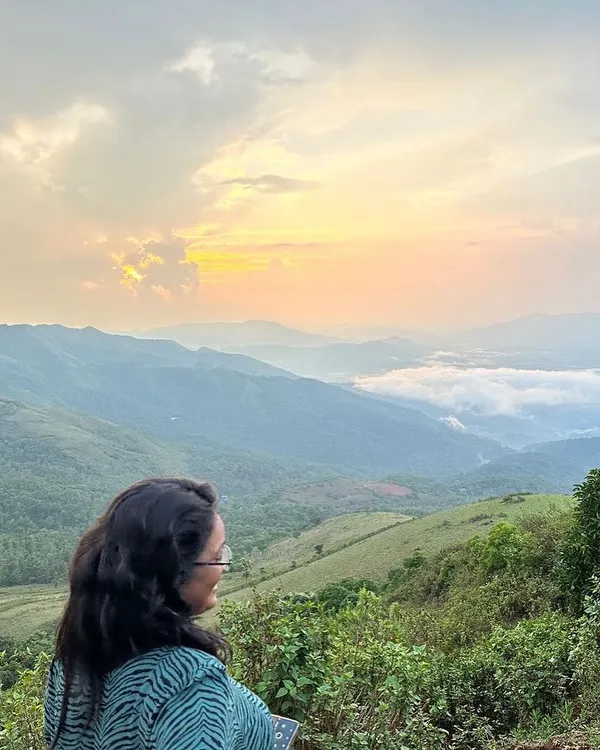 A breathtaking sunrise view from the hills of Chikmagalur, the land of coffee. We start our days early to catch these magical moments above the clouds.