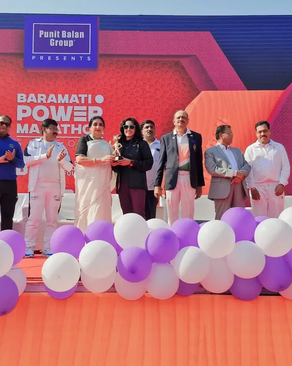 Receiving my trophy at the Baramati Power Marathon. A 3:15 full marathon finish and an overall first place. This is what happens when you create the victory in your mind first, then make it a reality.