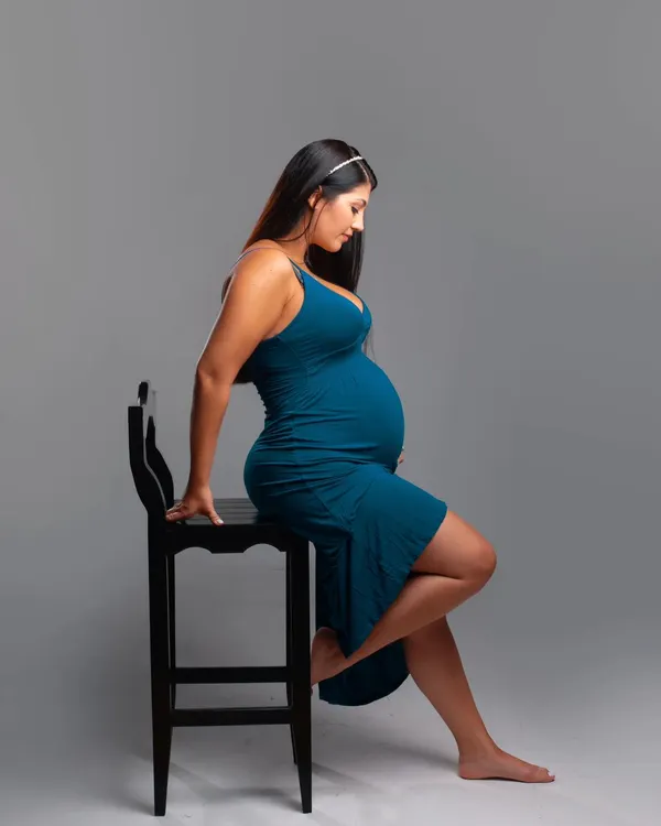 A simple and elegant studio maternity portrait. I focus on creating a comfortable atmosphere where you can celebrate your beautiful baby bump and the incredible journey you are on.