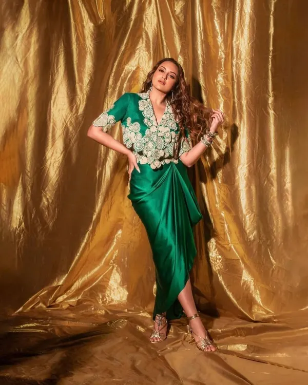 For the 'Heeramandi' promotions, we styled Sonakshi Sinha in this regal green draped ensemble by Anamika Khanna. The look, complete with intricate embroidery and traditional jewelry, was designed to reflect the grandeur of the series.