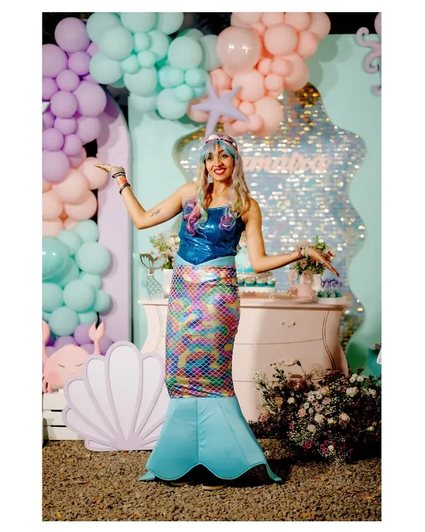 We can arrange for character appearances to match your theme, like this magical mermaid who brought our under-the-sea party to life.