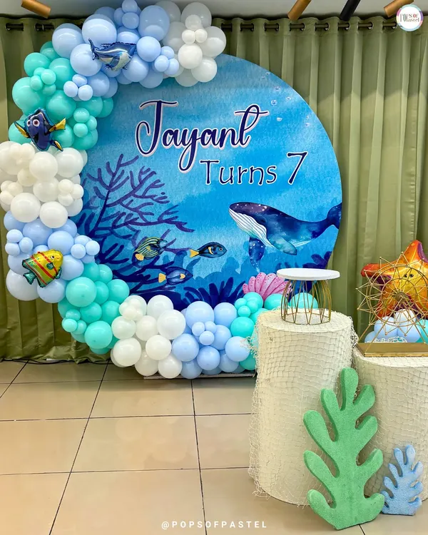 An "Under The Sea" themed birthday backdrop, complete with a stunning balloon arch and custom signage. We can bring any party theme to life!
