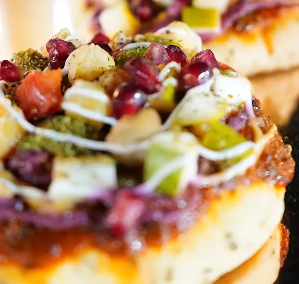 This is my signature katori chaat, a perfect single-serving appetizer. It combines the traditional tangy and savory flavors of chaat in a crispy, edible bowl for a modern and mess-free experience.