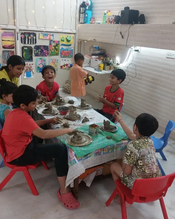 This is what pure joy looks like! In our clay workshops, kids get their hands messy, laugh, learn, and create beautiful Ganesha idols from scratch. It’s all about the experience and the happy memories we make together.