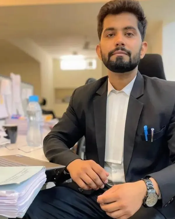 As your advocate, I am committed to providing clear, strategic counsel. This photo captures me at my desk, where I dedicate my time to case preparation and legal research to build the strongest possible case for you.