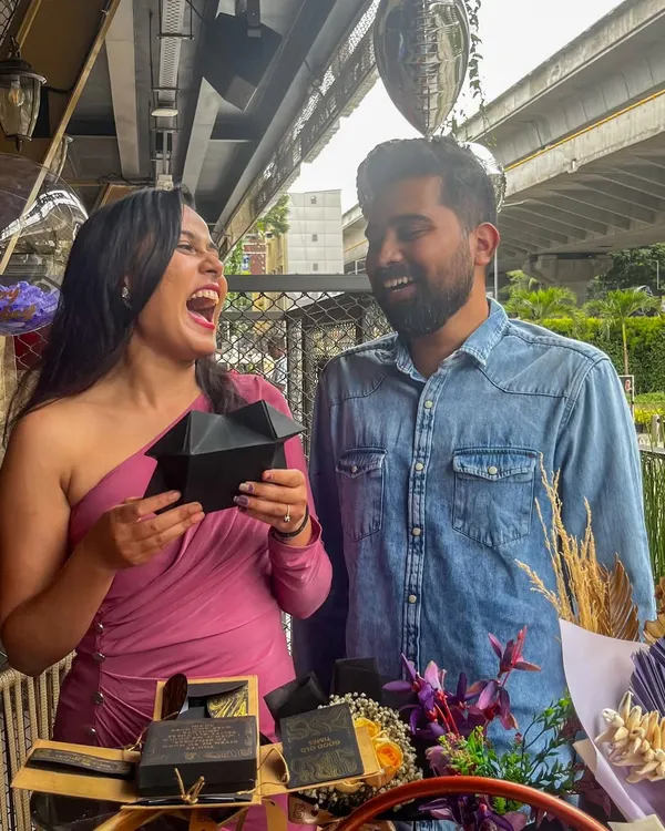 The 'Time Travel' experience is all about reliving your best memories together. Here, a couple enjoys opening a personalized memory box, one of the many elements I include to make the day special.