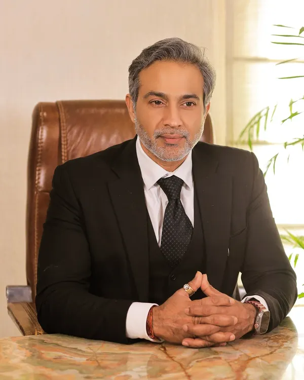 Seated at my desk, where strategy is formed and cases are built. With over two decades of experience in criminal and constitutional law, I approach every matter with an unwavering resolve to see justice served. This is not just my profession; it is my commitment.