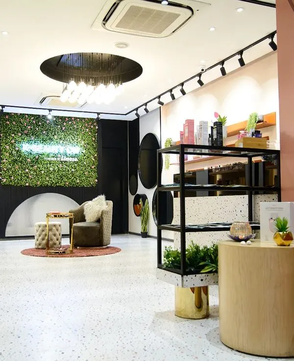 The interior of the Limese skincare store in Delhi, a project we designed and executed. The space features terrazzo floors, soft pink accents, and a living green wall to reflect the brand's fresh and natural identity.
