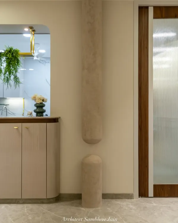An architectural highlight that redefines lighting. This sculptural column light was meticulously crafted on site, merging form and function into a seamless statement piece. Wrapped in a suede-textured finish, it stands as a quiet yet powerful masterpiece.