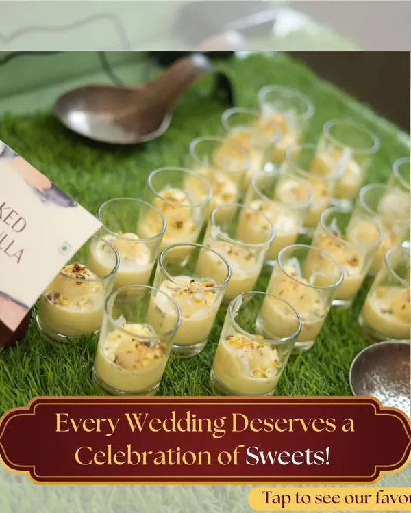 Every wedding deserves a grand celebration of sweets. This image shows our Baked Rasgulla, an innovative take on a classic Indian dessert, served in individual glasses for an elegant touch.