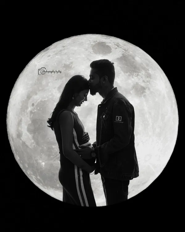 A breathtaking silhouette of a couple against a full moon backdrop. This creative studio concept is perfect for creating dramatic and artistic maternity portraits.