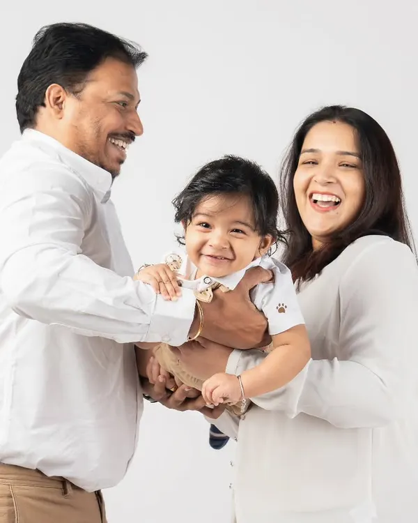 Pure, unrestrained joy! Capturing genuine laughter is my favorite part of photographing families with young children. These moments are truly priceless.