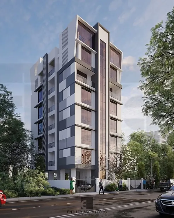 This Stilt+6 floor residential project in Panvel showcases a modern facade treatment. The interplay of solid panels and glass creates a visually engaging exterior while providing functional and well-lit apartment spaces within.