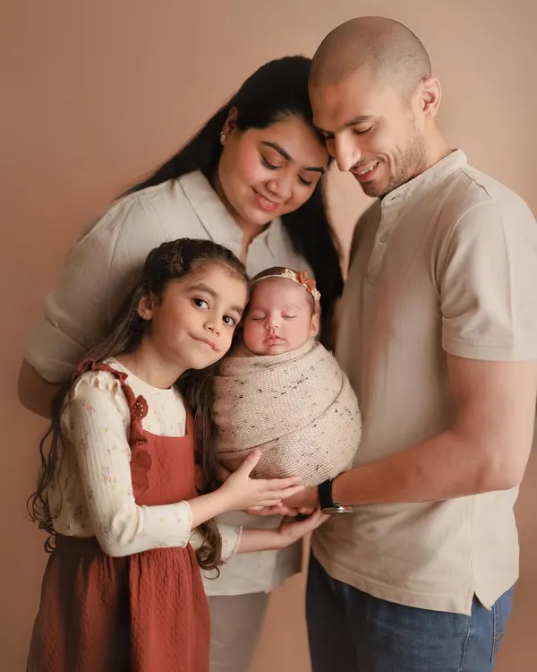 A beautiful family portrait, complete with a proud big sister. Capturing the joy and love of a growing family is one of the most rewarding parts of my job.