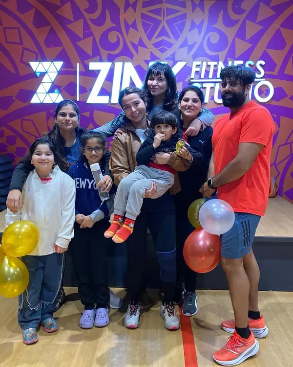 Celebrating together is a big part of the Zink Fitness experience. Here is a happy group photo with members of all ages after a fun event at the studio.