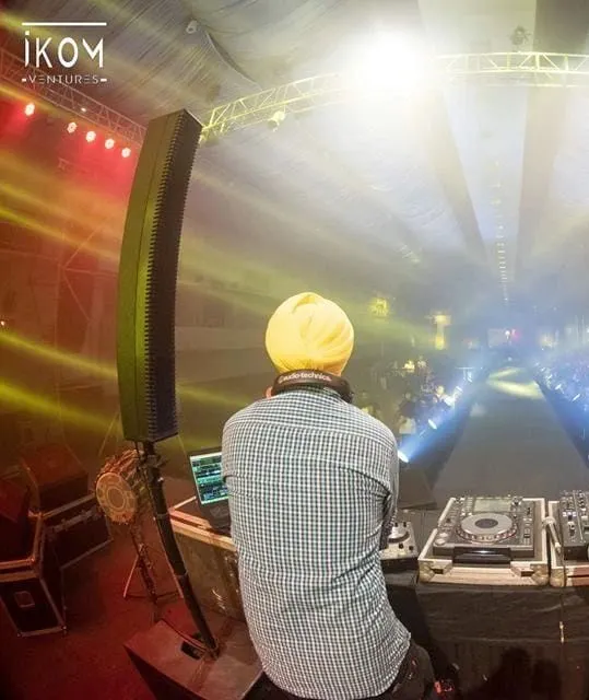 A view from behind my console at a large-scale fashion show. The effort I put into preparation is directly proportional to the results you see on the dance floor.