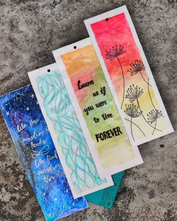 This collection shows the variety of my hand-painted bookmarks. I create designs for every mood, including cosmic galaxy themes, hand-lettered quotes, abstract waves, and delicate floral patterns, all painted on high-quality, textured paper.