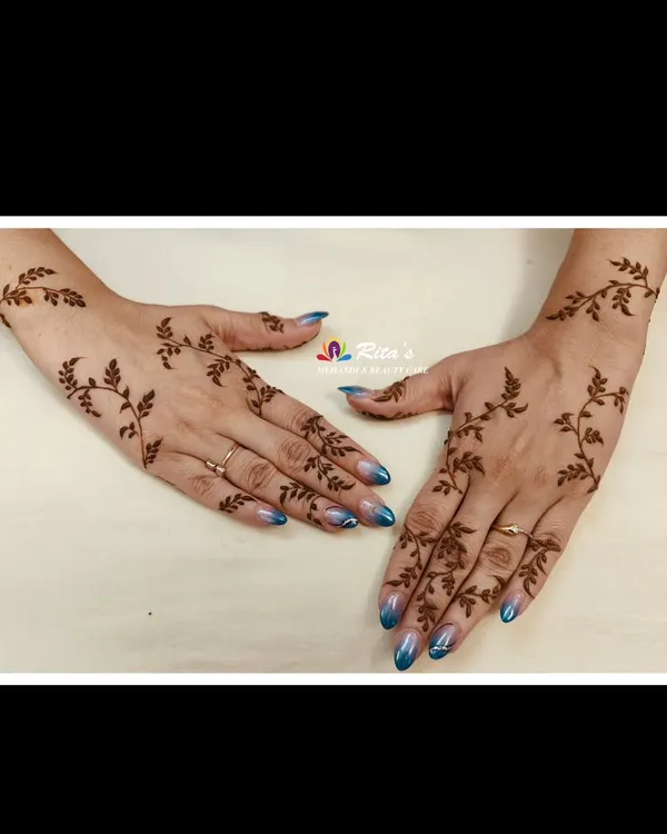 For when you just want 'thodi si mehendi'. This delicate leafy vine pattern is a perfect example of minimalist henna. It's elegant, modern, and beautiful for any occasion.