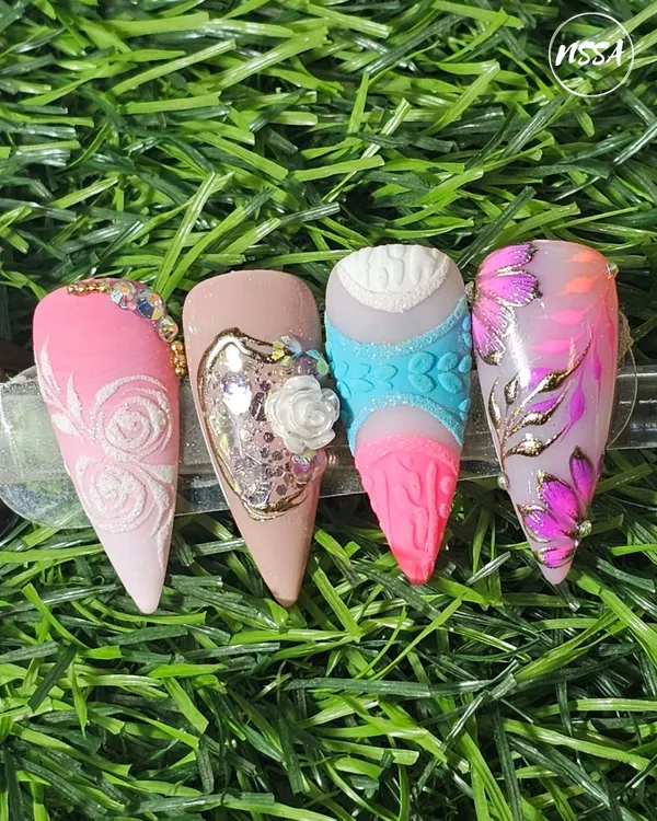 A showcase of four distinct and advanced nail art styles, from embossed textures to encapsulated glitter and hand-painted art. We teach you the versatility to cater to any client request.