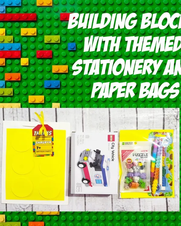 This building blocks hamper includes a small vehicle block set and themed stationery, all packed in a colorful, handmade block-themed paper bag.