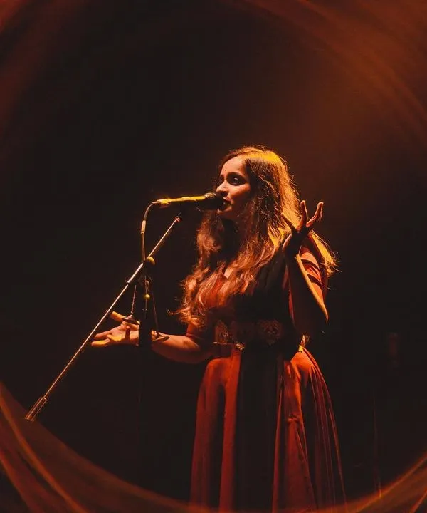 This is me in my element, lost in the music on stage. Every performance is a journey, and my goal is to take you with me, sharing every note and emotion. This image captures that feeling of being completely surrounded by sound and light.
