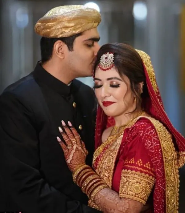 A beautiful moment captured for my bride in a classic red lehenga. I created a timeless bridal makeup look with soft gold shimmery eyes, a bold red lip, and a radiant skin finish that photographed beautifully. You can also see the rich stain from her bridal henna, another service I lovingly provide.