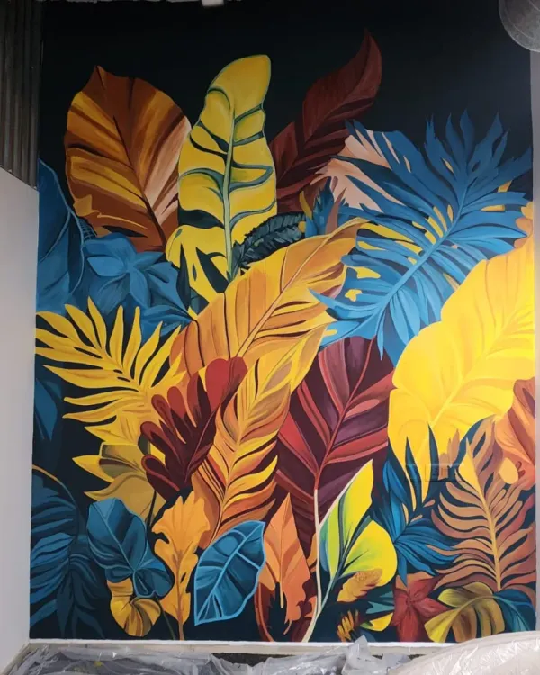 We transformed this office wall in Gurugram into a vibrant botanical masterpiece. This mural uses bold, contrasting colors to create a focal point that energizes the entire workspace, proving that corporate environments can be both professional and inspiring.