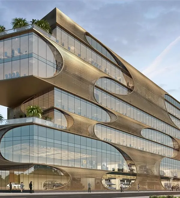 This commercial building, designed for Mercedes, features a modern jaali screen that acts as a shading device. The staggered levels are interspersed with interactive green spaces, and the perforated façade creates a unique play of light and shadow.