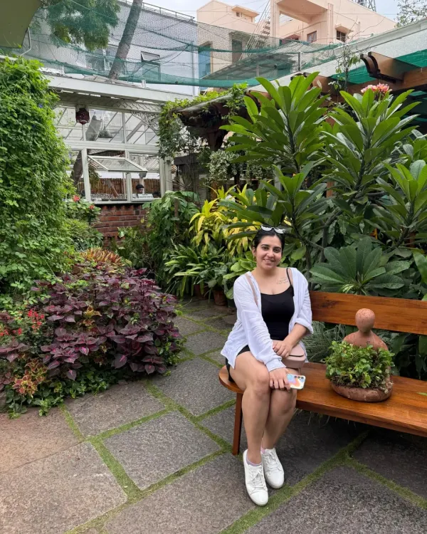 A quiet moment in a lush green cafe. Finding pockets of nature within the city is one of my favorite ways to recharge.