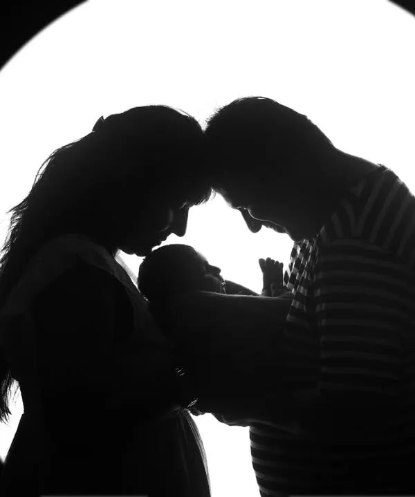 There is nothing more powerful than the moment a family begins. I create these timeless silhouette portraits to capture the profound love and connection in those first few days with your newborn, creating an artistic memory you will hold dear forever.