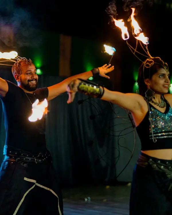 A synchronized fire act with my partner Yacobeh at a wedding in Mysore. Our duo performances are built on trust, chemistry, and a shared passion for flow arts.