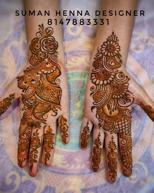 A classic example of an Indo-Arabic design, combining bold Arabic floral vines with finer, detailed fillings typical of Indian henna art.