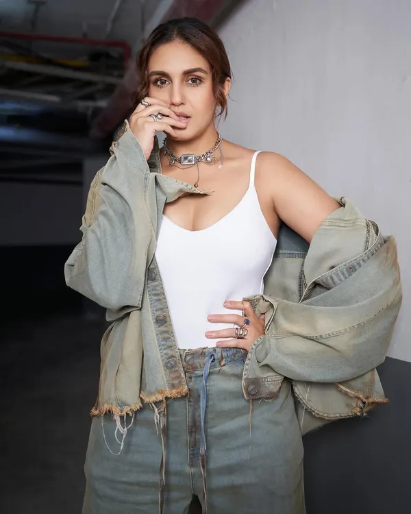 A closer look at the raw, grunge moment we styled with Huma Qureshi. The distressed denim co-ord from Huemn, paired with a silver choker, is all about that edgy, off-duty vibe.