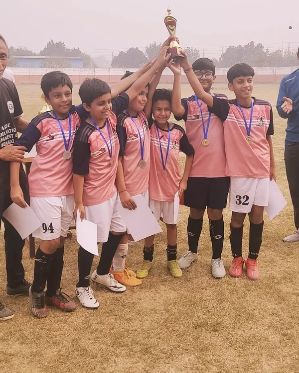 Our Under-11 team proudly lifts the championship trophy after a hard-fought intra-academy tournament. Moments like these build confidence and team spirit.