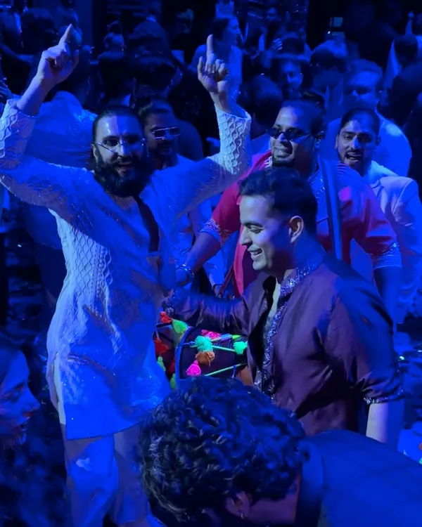 Sangeet night turned into a full-on Bollywood set with Ranveer Singh. We were thrilled to match his incredible energy and rule the vibe together.