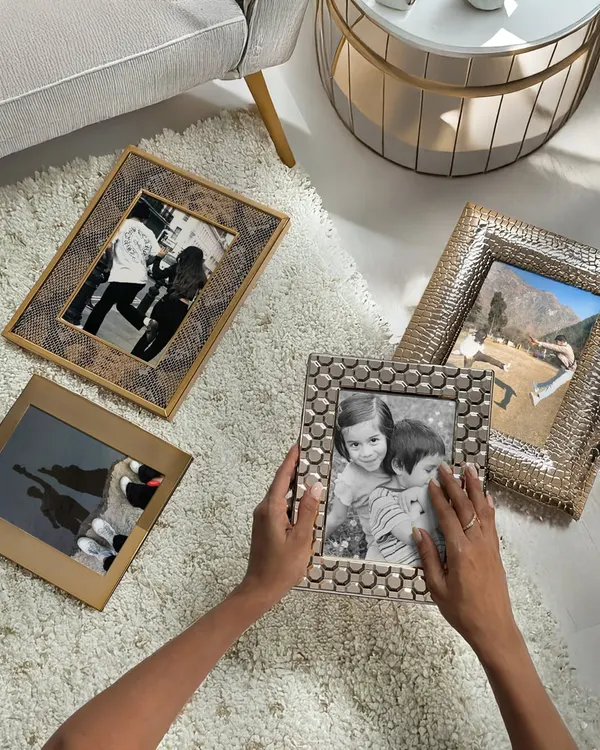 This Rakhi, frame the moments that make your bond priceless. My collection of photo frames, with varied textures from snakeskin to hammered silver, offers a beautiful way to cherish your memories.