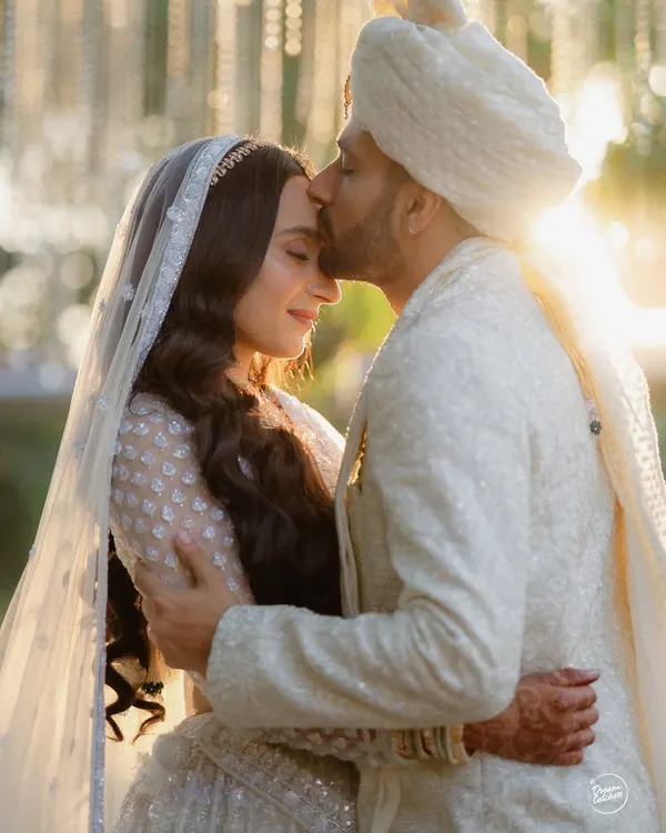 A quiet moment of love during golden hour at Gallops, Mumbai. I live for these unscripted embraces, where the setting sun and the couple's connection create pure magic. This is the essence of a fine art wedding portrait.