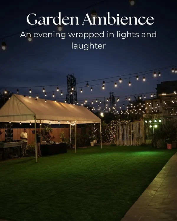 An evening at the Terrace Garden, wrapped in the warm glow of string lights, creating a perfect garden ambiance for laughter and celebration.