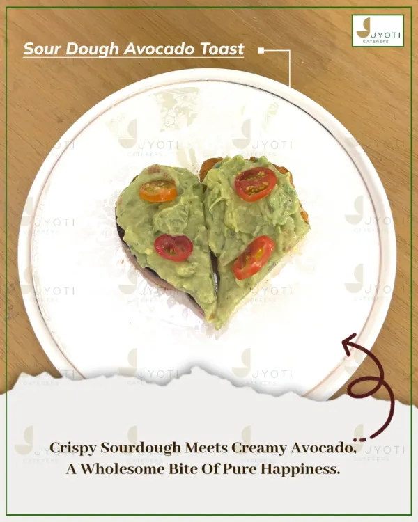 A wholesome bite of pure happiness. This Sourdough Avocado Toast is shaped like a heart, combining crispy bread with creamy avocado and fresh cherry tomatoes.
