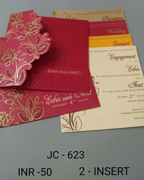 A vibrant red pocket-fold invitation with a gold foil floral design. This affordable card comes with multiple inserts, making it a festive choice for a traditional wedding.