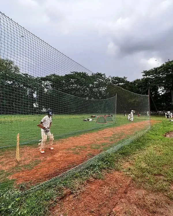 A typical evening at our outdoor nets in Kharghar. This is where players face different challenges, learning to play on a natural turf wicket under the open sky, which is crucial for match temperament.