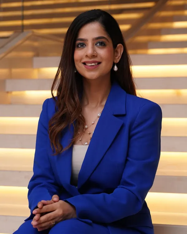 A close-up portrait showcasing a confident and professional look. I believe that an emcee's presence begins with their expression: approachable, confident, and ready to connect with the audience.