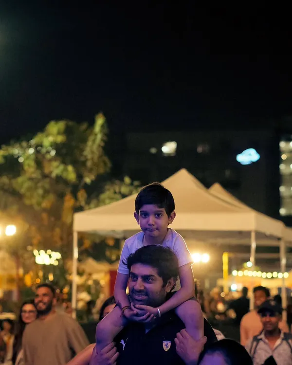 Music is for everyone, from the youngest to the oldest. A father and his child enjoying the music at one of my outdoor shows. It's a beautiful sight to see.